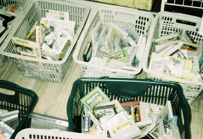 Baskets full of mixed products in a discount bin store